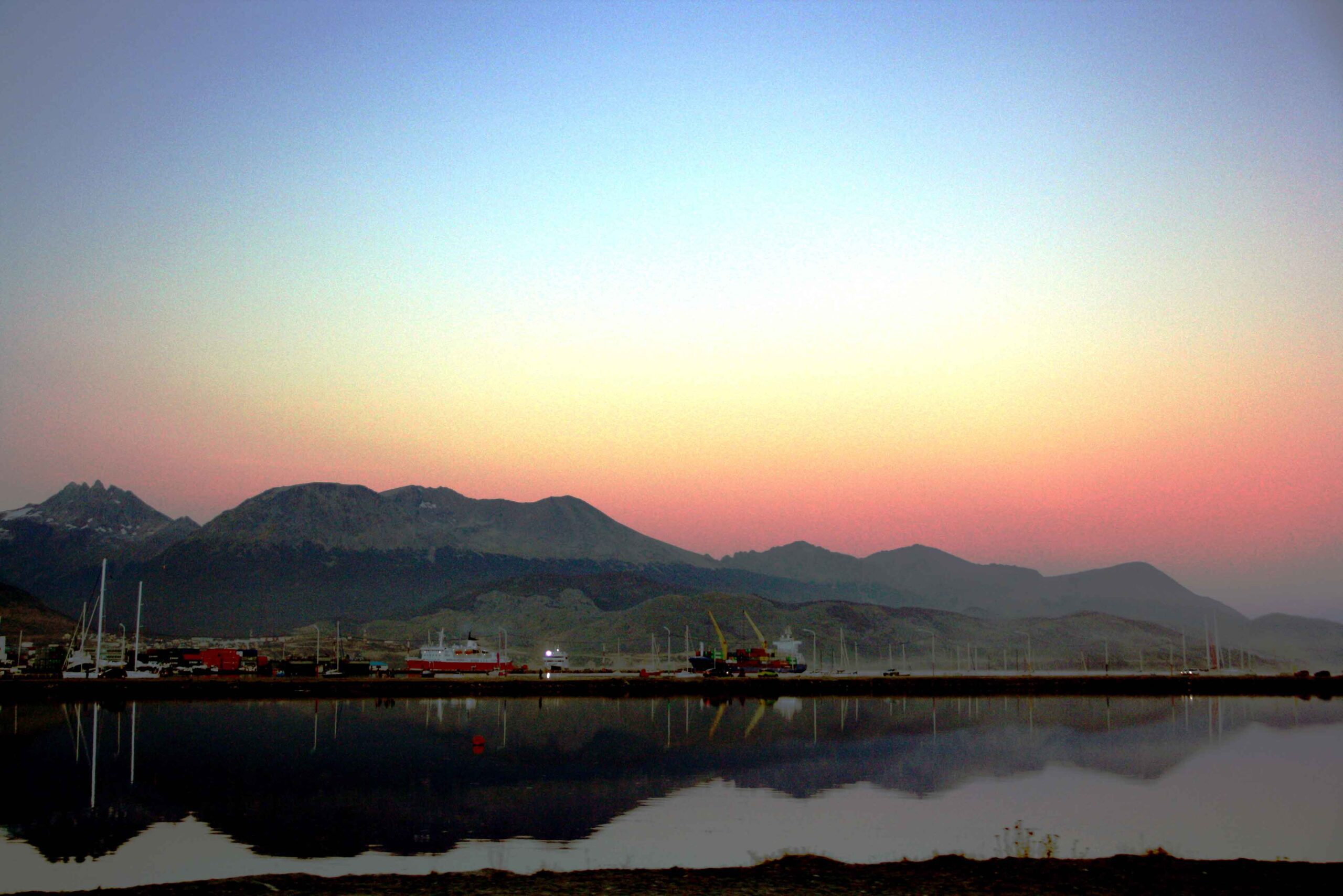 sunrise ocean mountains ships ushuaia