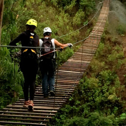 ziplining crossing bridge inca jungle trail Peru