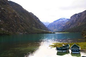lake view with boats in the cordillera blanca