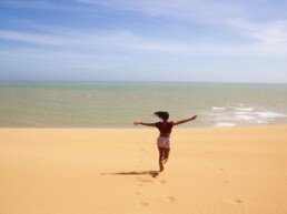 running in the desert dunes of Punta Gallinas Colombia