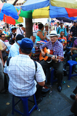 Man playing music on Medellin square Colombia