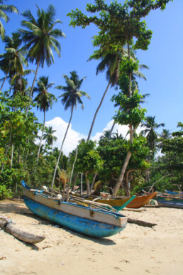 fishermen boat hiriketiya bay beach sri lanka