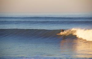 sunrise surfing clean waves praia do cabedelo portugal