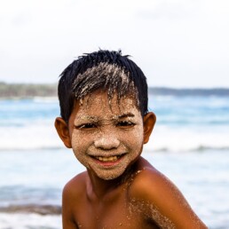 Boy on the beach on Simeulue Island Sumatra