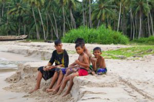 boys beach palmtrees simeulue island sumatra