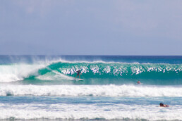 Surfing waves on Balangan Beach Bali