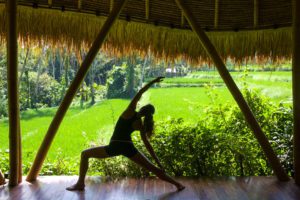yoga lesson sandat glamping tents ubud bali