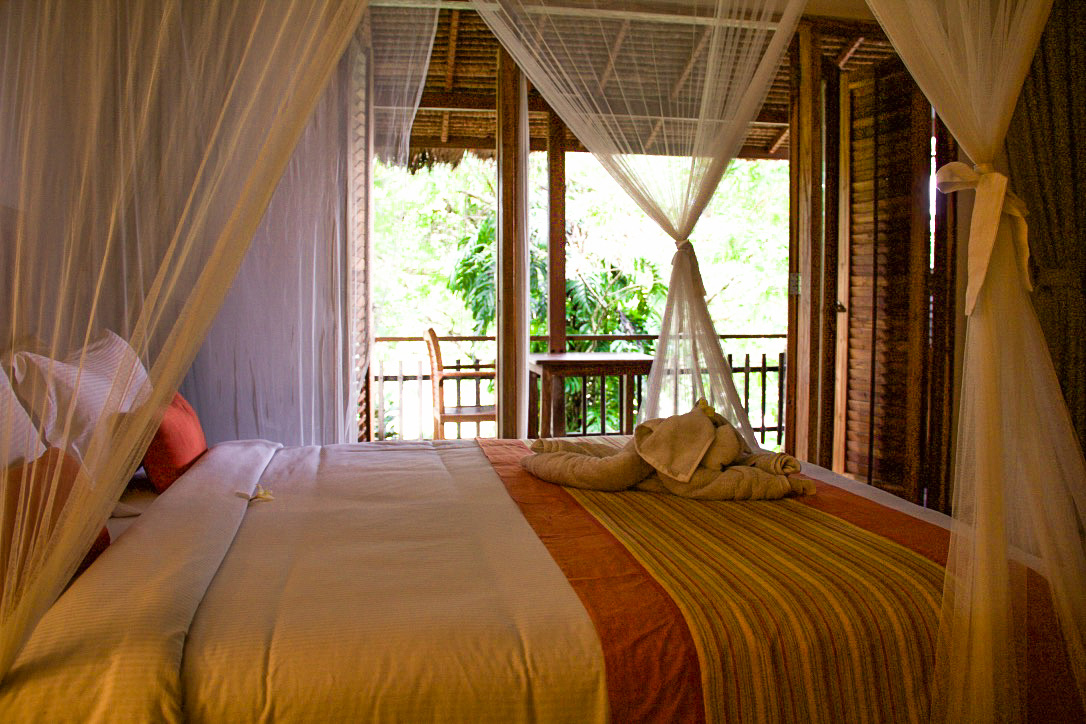 Bed room at Svarga Loka Wellness resort in Ubud