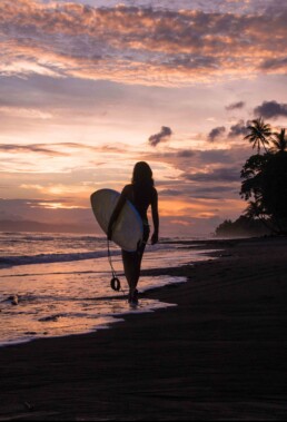 surfer girl sunset Punta Banco Costa Rica