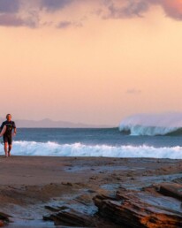 Surfer during sunset at Playa Popoyo Nicaragua