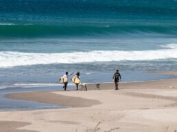Surfers at Popoyo beach in Nicaragua