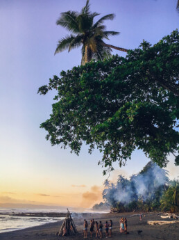 Bonfire on the beach during Mokum Surf Club retreat in Costa Rica