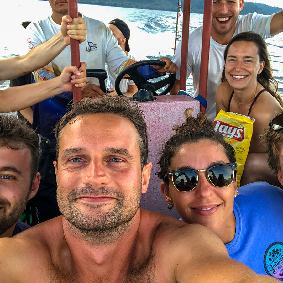 Mokum Surf Club retreat group on a boat trip in Costa Rica