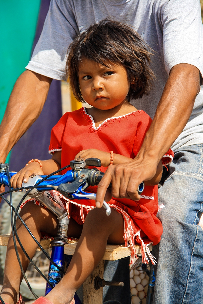 Girl on a bicycle in Colombia