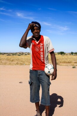 Man in Ajax shirt in the desert of Namibia