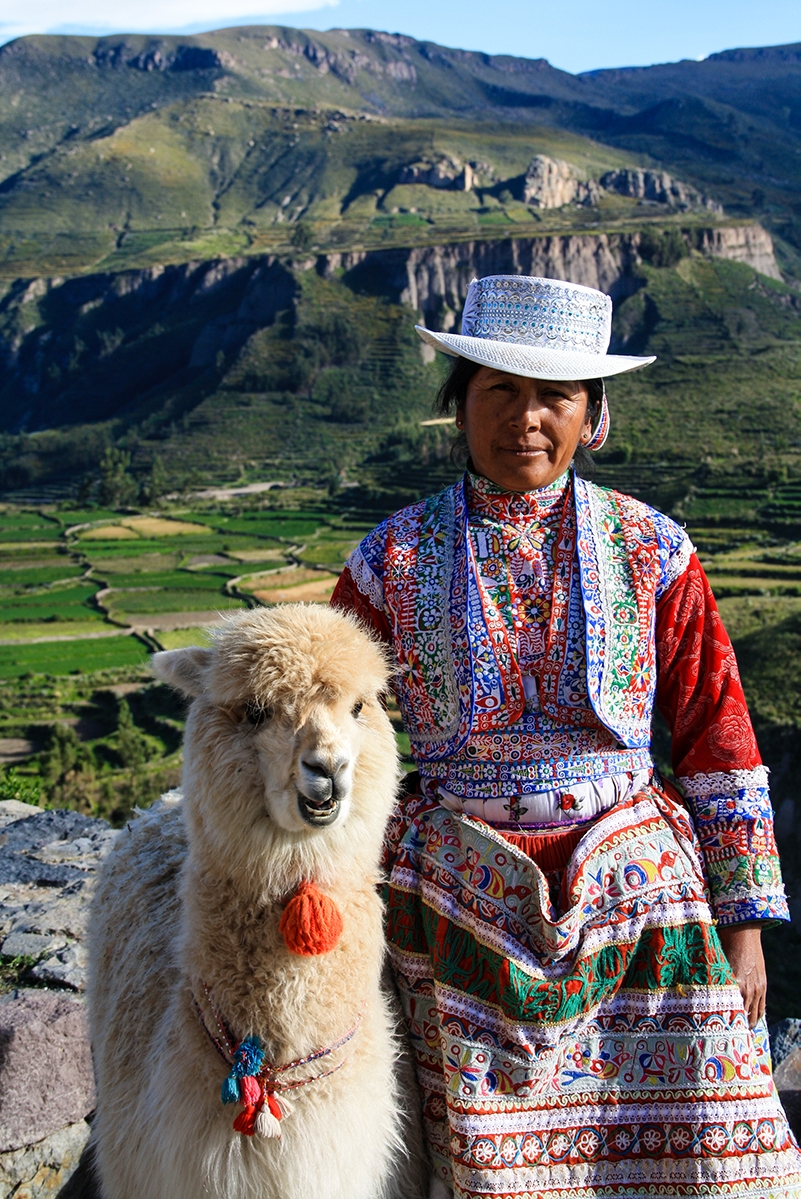 Woman and alpaca in the Colca Canyon Peru