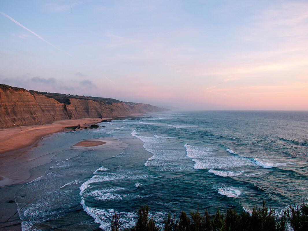 Sunset over Praia Magoito Portugal