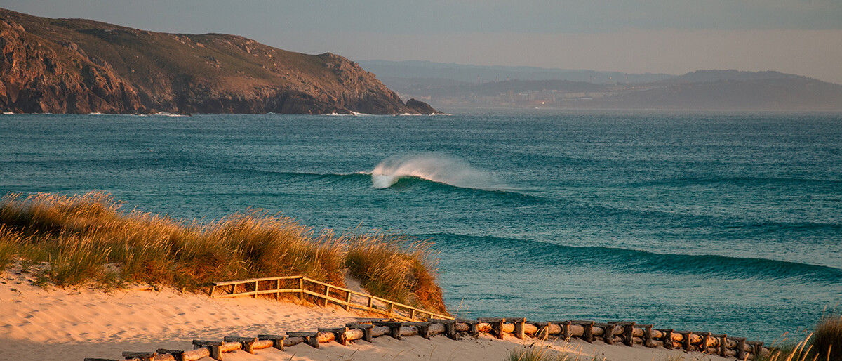Sunset surf session at Praia de Doniños