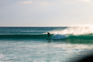 Surfer at Praia de Doniños