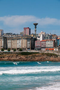 Surfers at Praia del Orzan in A Coruña
