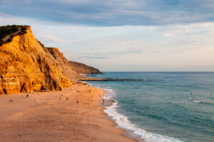 Sunset at surf spot Praia do Sao Juliao