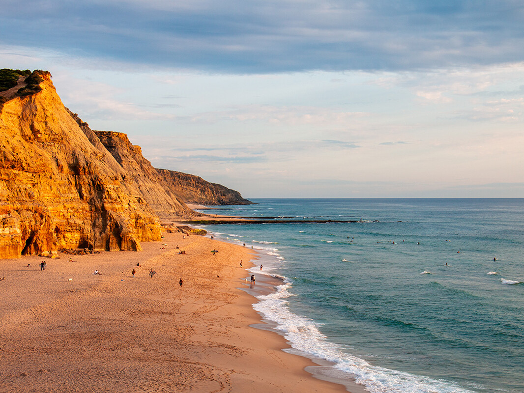 Sunset at surf spot Praia do Sao Juliao