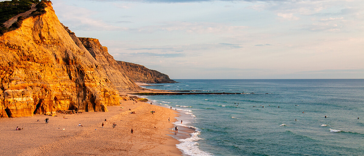 Sunset at surf spot Praia do Sao Juliao
