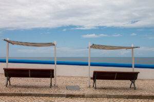 Benches with ocean view in the old town of Ericeira in Portugal