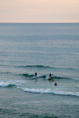 Surfers at Foz do Lizandro in Ericeira