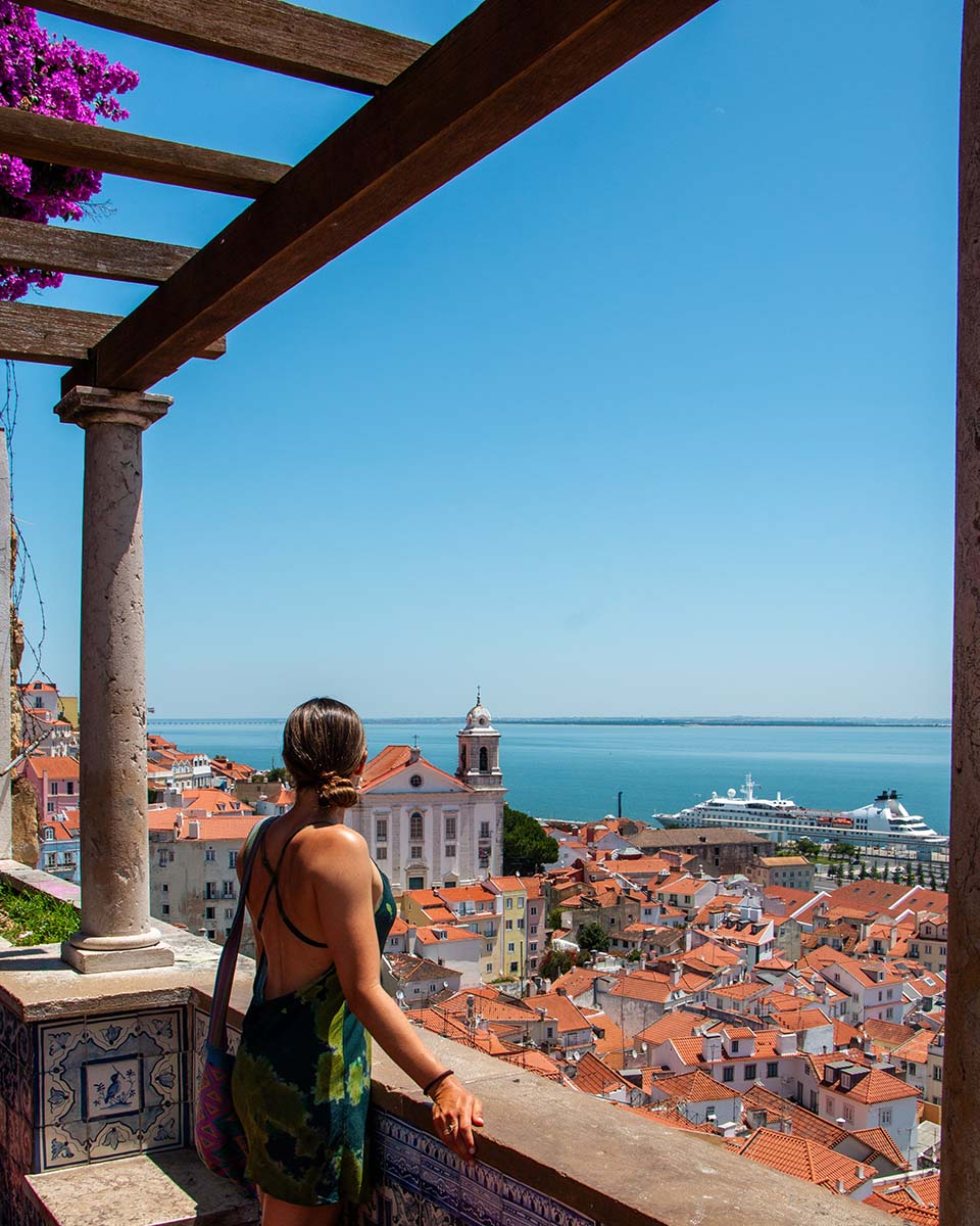 Girl at lookout overlooking Lisbon in Portugal