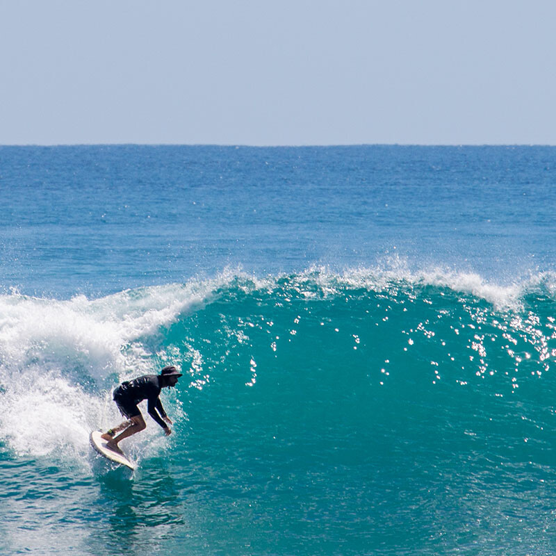 Surfer on a wave during Mokum Surf Club Costa Rica retreat
