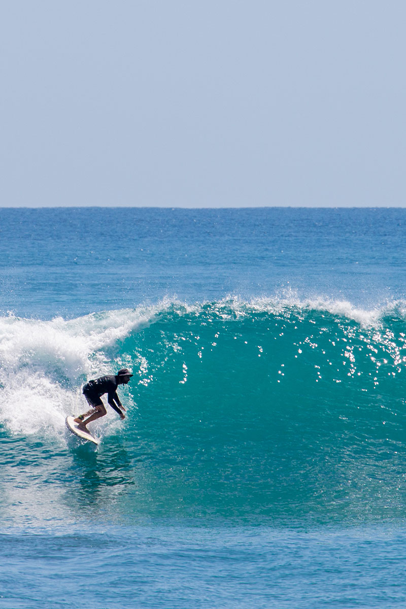 Surfer on a wave during Mokum Surf Club Costa Rica retreat