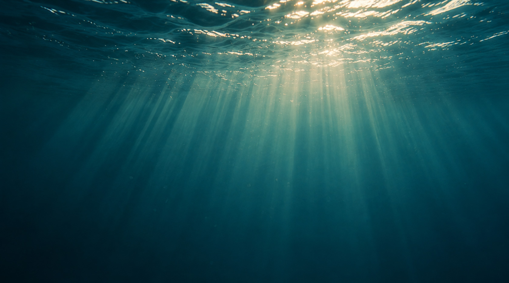 Light rays shining through the ocean surface in Costa Rica